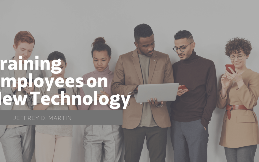 Jeffrey D. Martin Training Employees on New Technology